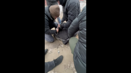 Russia detains nine over calls to murder soldiers and families