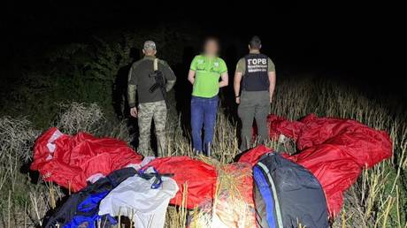 Fighting-age Ukrainian arrested readying paraglider to flee