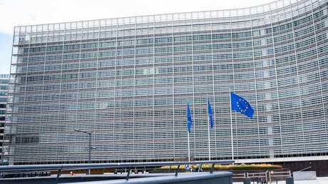 European Union flags fly in front of the office of the European Commission in Brussels.