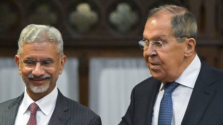 Russian Foreign Minister Sergey Lavrov welcomes Indian Foreign Minister Subrahmanyam Jaishankar, left, before a meeting, in Moscow, Russia.