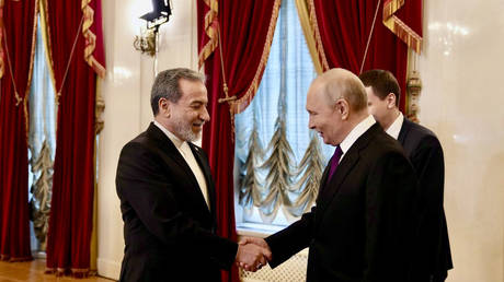 Iranian Foreign Minister Abbas Araghchi meets with the Russian President Vladimir Putin in St. Petersburg, Russia, April 27, 2026.