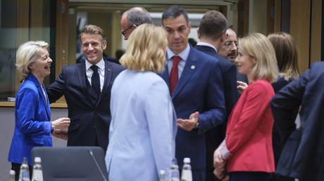 European Commission President Ursula von der Leyen converses with French President Emmanuel Macron, German Chancellor Friedrich Merz, High Representative for Foreign Affairs and Security Policy Kaja Kallas, and several other senior officials at the European Council headquarters in Brussels.