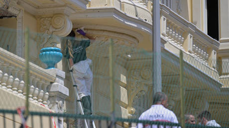 Investigators at the scene where an explosive device seriously injured three people in Monaco, June 30, 2026.