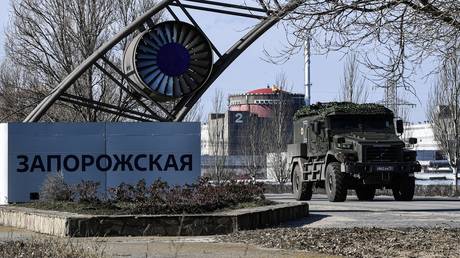 FILE PHOTO: A view of the Zaporozhye Nuclear Power Plant and a Russian armored vehicle near Energodar, Zaporozhye Region, Russia, February 7, 2024.